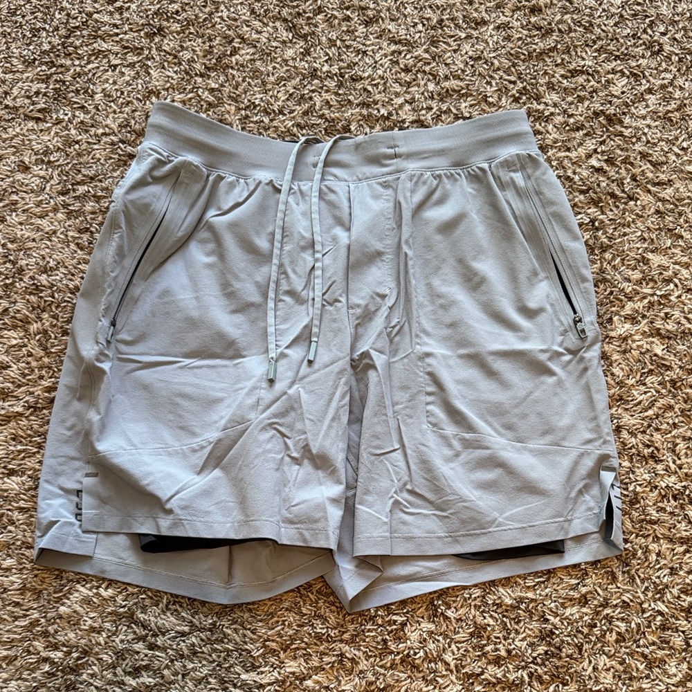 lululemon Light Gray license to train shorts with liner.